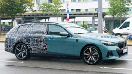 Так выглядит новейшая BMW 5-series в кузове универсал. Живые фото новинки, лишь частично прикрытой камуфляжем